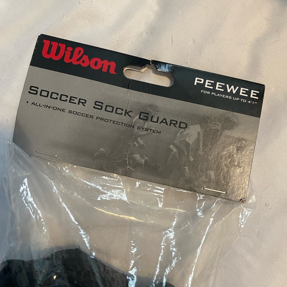 Wilson PeeWee Soccer sock Guards. NWT - Black